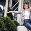 Woman waits at the airport for her mystery flight