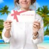 Woman with Mystery Weekend Voucher for Unique Getaways