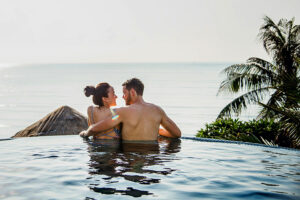 Couples getaway - a couple in the plunge Infiniti pool